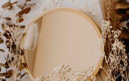 brown and white round mirror